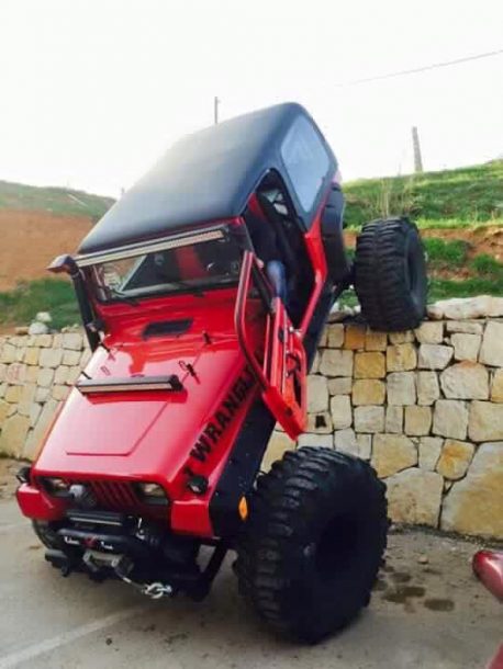 Jeep Wrangler YJ climbing a wall