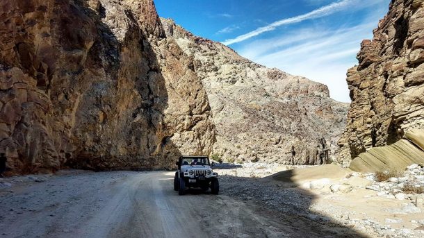 Jeep in a desert canyon